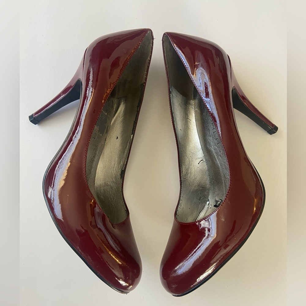 Burgundy in color. Gently used